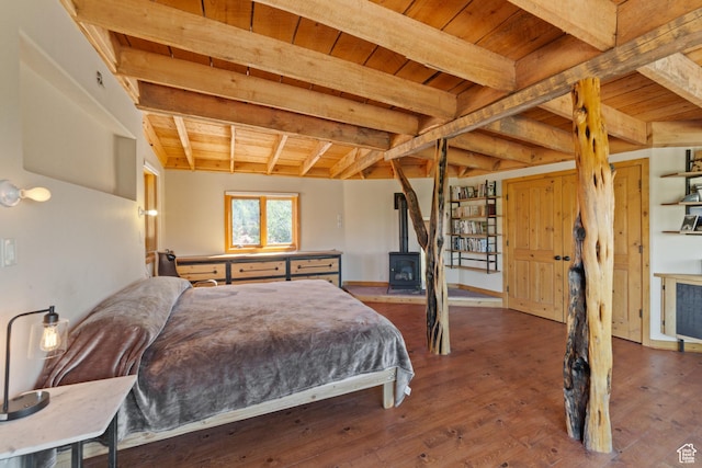 338 Taylor Ln, Castle Valley, UT 84532 - bedroom featuring a wooden ceiling with exposed beams, a wood stove, and wood finished floors