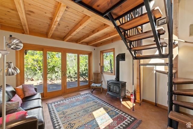 338 Taylor Ln, Castle Valley, UT 84532 - living room with a wood ceiling with exposed beams, stairway, french doors, and a wood stove
