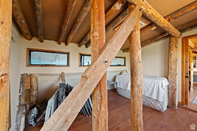 338 Taylor Ln, Castle Valley, UT 84532 - bedroom featuring wood finished floors and beamed ceiling