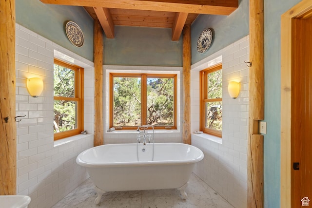 338 Taylor Ln, Castle Valley, UT 84532 - bathroom featuring a soaking tub, healthy amount of natural light, and a wood ceiling with exposed beams