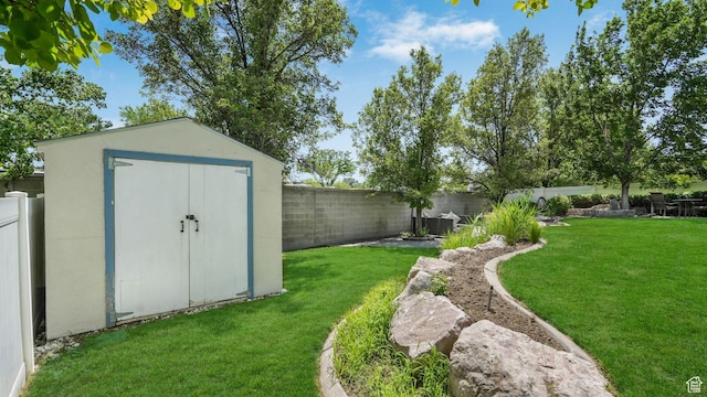 1257 W Bateman Ponds Way S, West Jordan, UT 84084 - fenced backyard with a storage unit