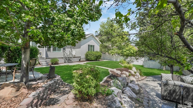 1257 W Bateman Ponds Way S, West Jordan, UT 84084 - view of yard with a patio area
