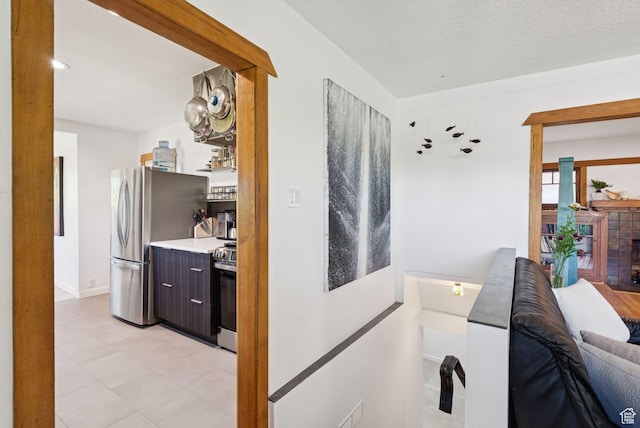 1527 E Emerson Ave S, Salt Lake City, UT 84105 - hall featuring light tile patterned floors and baseboards