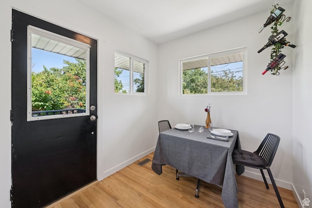 1527 E Emerson Ave S, Salt Lake City, UT 84105 - dining space featuring wood finished floors and plenty of natural light