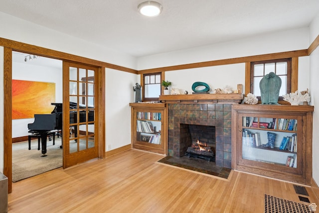 1527 E Emerson Ave S, Salt Lake City, UT 84105 - living area featuring wood finished floors and a fireplace