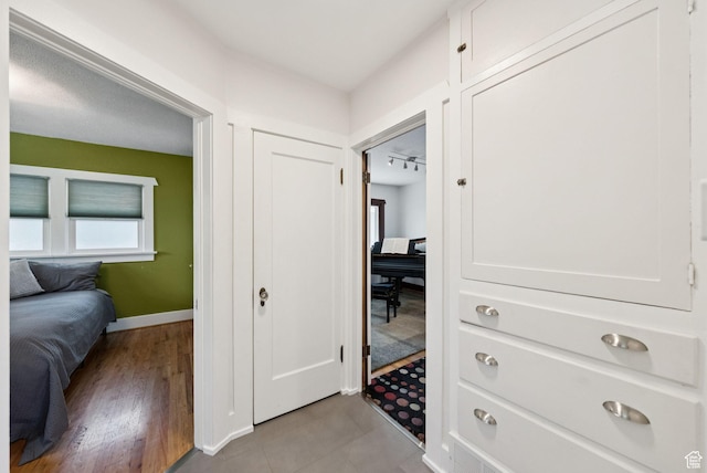 1527 E Emerson Ave S, Salt Lake City, UT 84105 - hall featuring baseboards and tile patterned flooring