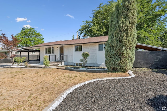147 E 1700 S, Orem, UT 84058 - ranch-style house featuring brick siding and an attached carport