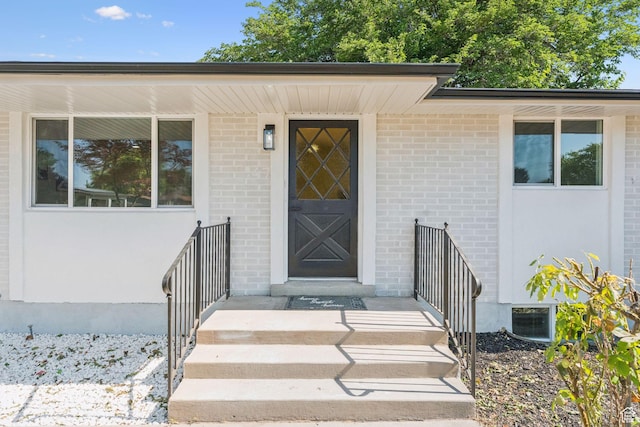 147 E 1700 S, Orem, UT 84058 - view of exterior entry featuring brick siding and stucco siding