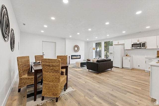 147 E 1700 S, Orem, UT 84058 - dining space featuring light wood-type flooring and recessed lighting