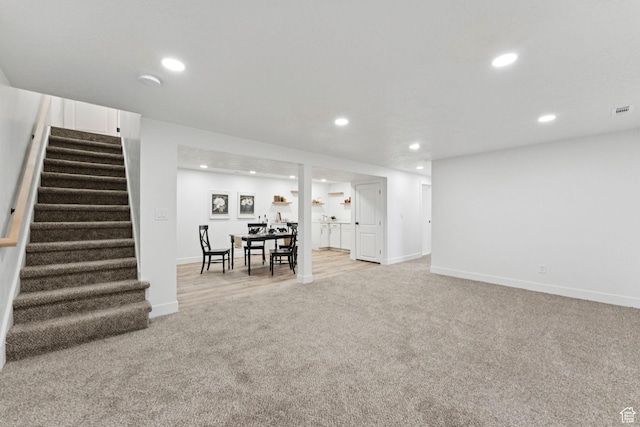 147 E 1700 S, Orem, UT 84058 - finished below grade area featuring light colored carpet, stairway, and recessed lighting