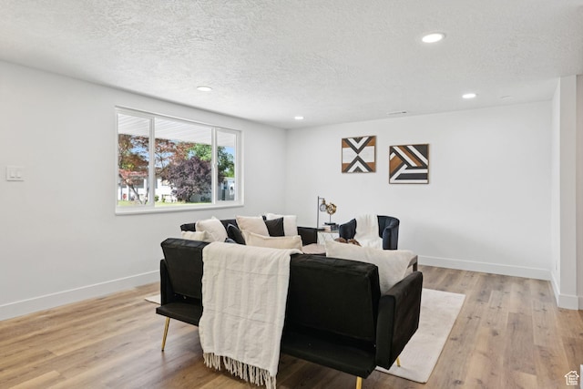 147 E 1700 S, Orem, UT 84058 - dining area featuring a textured ceiling, light wood finished floors, and recessed lighting