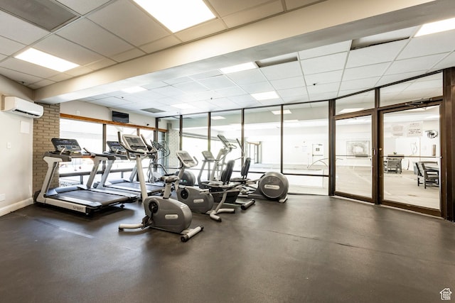 1415 Lowell Ave Unit 160, Park City, UT 84060 - gym with an AC wall unit, floor to ceiling windows, and a drop ceiling