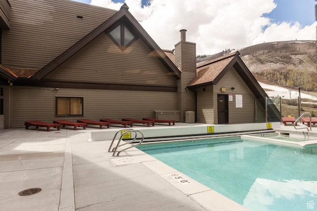 1415 Lowell Ave Unit 160, Park City, UT 84060 - community pool with a patio area, a mountain view, and a hot tub
