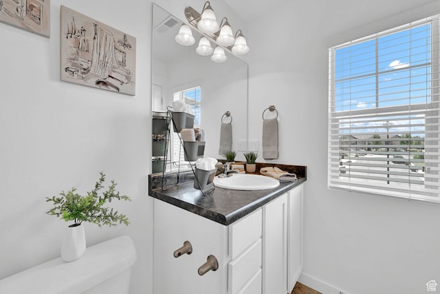 258 W 710 N, Centerville, UT 84014 - bathroom with vanity and a chandelier