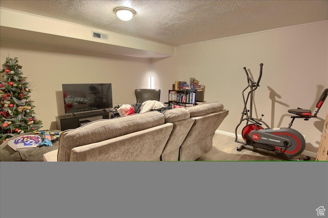 1714 E 5825 S, South Ogden, UT 84403 - living room with wood finished floors and a textured ceiling