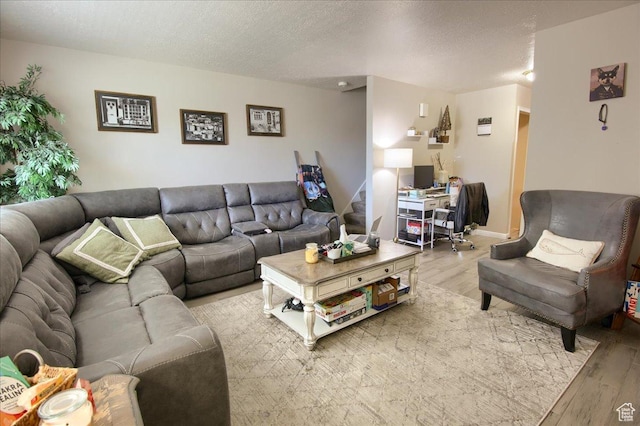 1714 E 5825 S, South Ogden, UT 84403 - living area featuring light wood-type flooring, an office area, and a textured ceiling