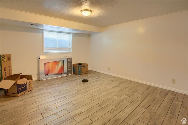 1714 E 5825 S, South Ogden, UT 84403 - basement with wood finished floors and a textured ceiling