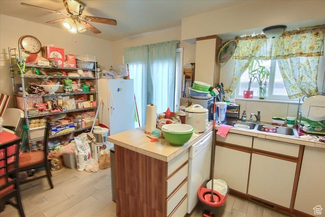1714 E 5825 S, South Ogden, UT 84403 - kitchen featuring white dishwasher, light wood-type flooring, and ceiling fan