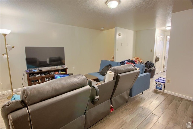 1714 E 5825 S, South Ogden, UT 84403 - home theater room featuring wood finished floors and a textured ceiling
