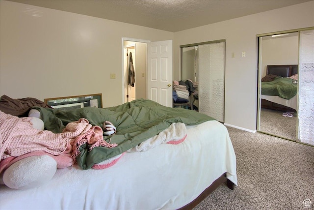 1714 E 5825 S, South Ogden, UT 84403 - bedroom with multiple closets and carpet flooring