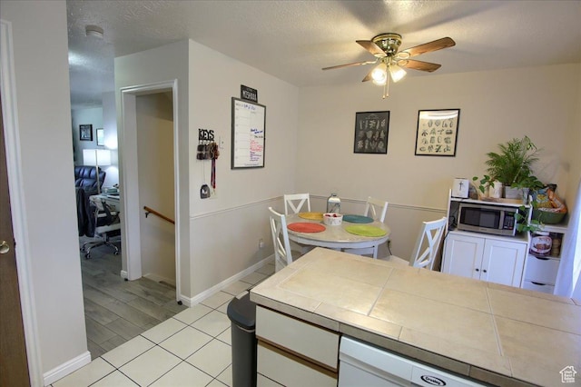 1714 E 5825 S, South Ogden, UT 84403 - dining room with a ceiling fan and baseboards