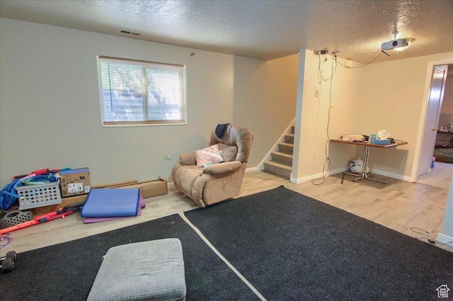 1714 E 5825 S, South Ogden, UT 84403 - game room with a textured ceiling and wood finished floors