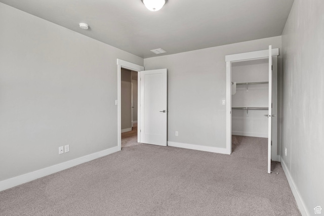 1371 W Stewart Falls Dr, Riverton, UT 84065 - unfurnished bedroom with carpet, a walk in closet, and a closet