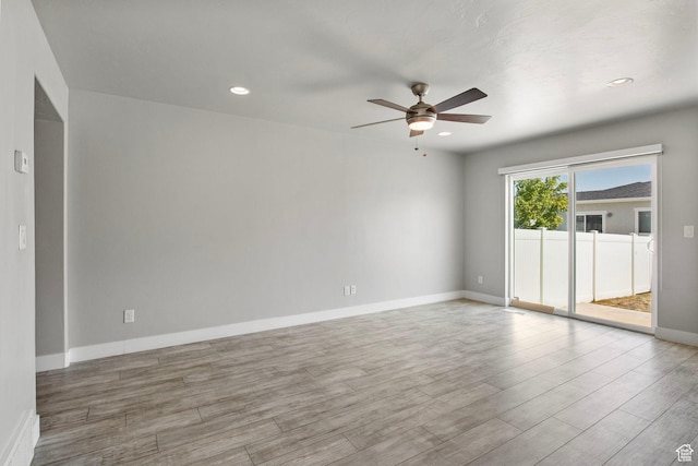 1371 W Stewart Falls Dr, Riverton, UT 84065 - spare room with ceiling fan, wood finished floors, and recessed lighting