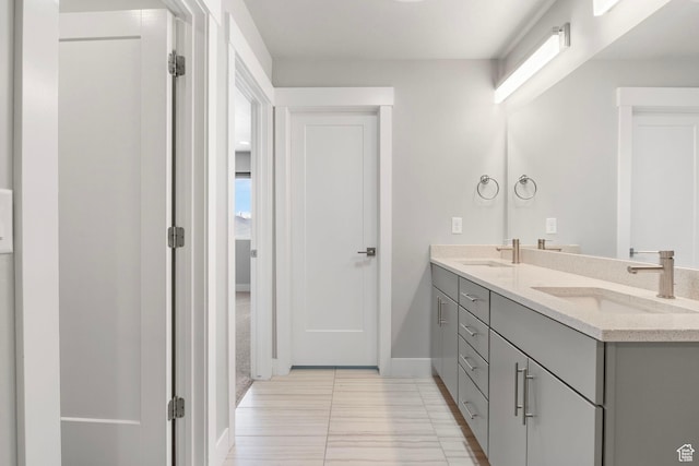 1371 W Stewart Falls Dr, Riverton, UT 84065 - bathroom featuring double vanity and baseboards