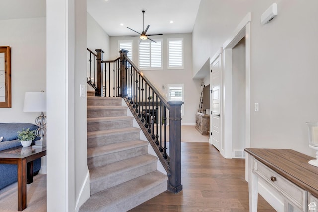 6462 W Shawnee Marie Way, Herriman, UT 84096 - staircase featuring a ceiling fan, wood finished floors, and recessed lighting