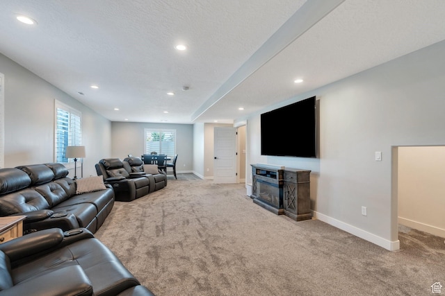 6462 W Shawnee Marie Way, Herriman, UT 84096 - living room with light colored carpet, recessed lighting, and a fireplace