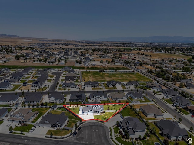 6462 W Shawnee Marie Way, Herriman, UT 84096 - aerial view of residential area with property parcel outlined and a mountain backdrop