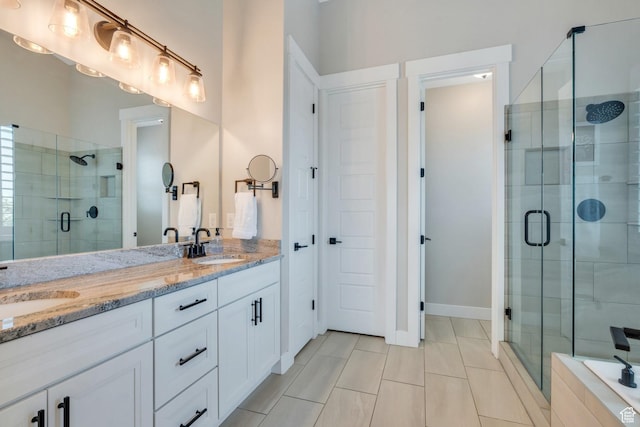 6462 W Shawnee Marie Way, Herriman, UT 84096 - full bathroom with a shower stall, double vanity, and tile patterned floors