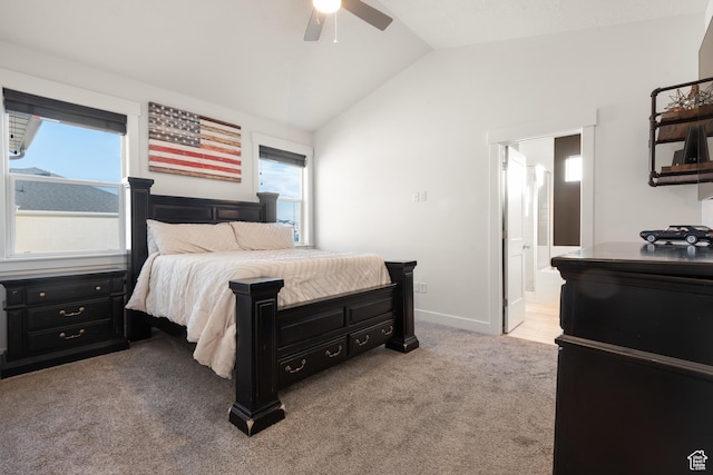 5057 N Foxtail W, Eagle Mountain, UT 84005 - carpeted bedroom featuring vaulted ceiling, multiple windows, a ceiling fan, and ensuite bathroom