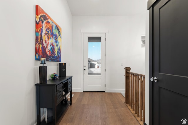 5057 N Foxtail W, Eagle Mountain, UT 84005 - doorway to outside with wood finished floors and baseboards