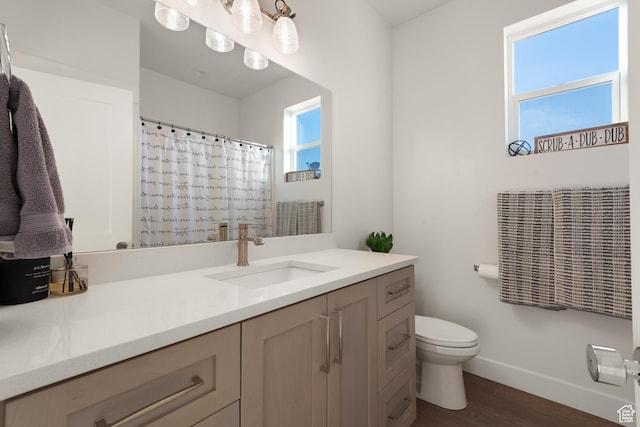 5057 N Foxtail W, Eagle Mountain, UT 84005 - bathroom with wood finished floors, vanity, and a shower with shower curtain
