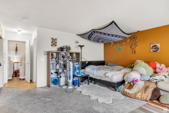 1876 E Casino Way S, Murray, UT 84121 - bedroom featuring carpet flooring and a textured ceiling