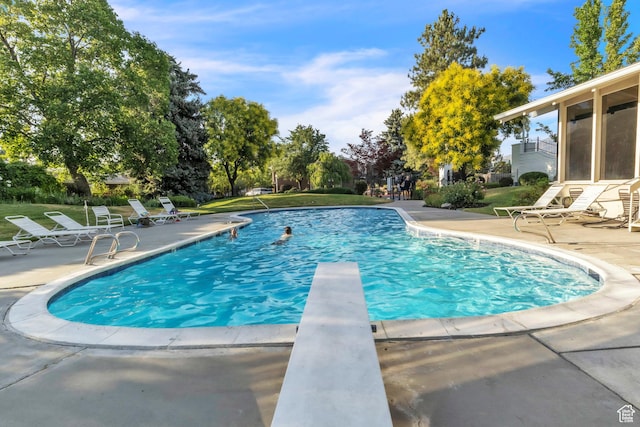 1876 E Casino Way S, Murray, UT 84121 - outdoor pool with a patio, a diving board, and a yard