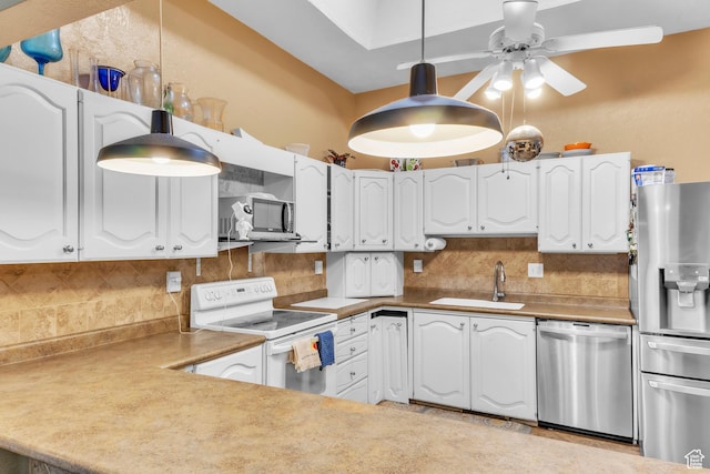 1876 E Casino Way S, Murray, UT 84121 - kitchen featuring stainless steel appliances, backsplash, a ceiling fan, and white cabinets