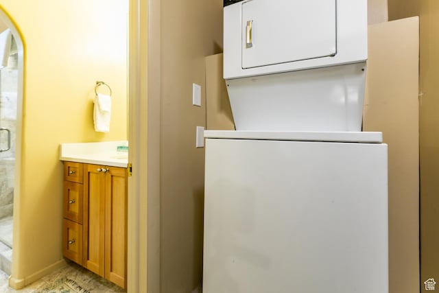 2100 Canyons Resort Dr Unit 21C, Park City, UT 84098 - laundry room with stacked washer / drying machine