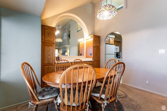 2100 Canyons Resort Dr Unit 21C, Park City, UT 84098 - carpeted dining room with arched walkways and high vaulted ceiling