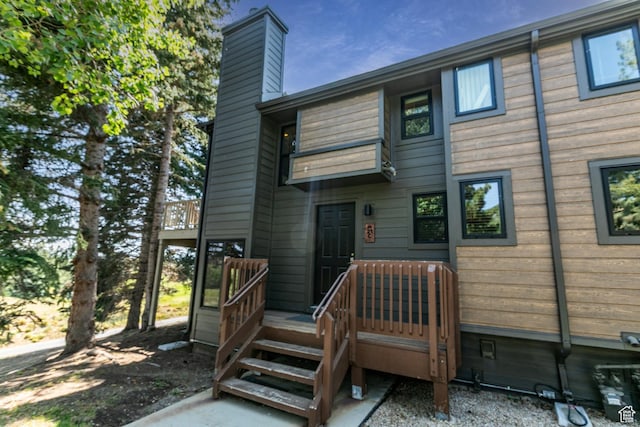 2100 Canyons Resort Dr Unit 21C, Park City, UT 84098 - back of house with a chimney