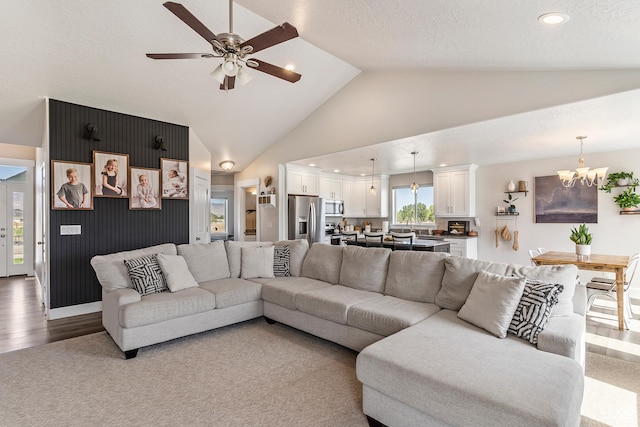 269 Cook Ln, Grantsville, UT 84029 - living room featuring a chandelier, vaulted ceiling, ceiling fan, recessed lighting, and wood finished floors