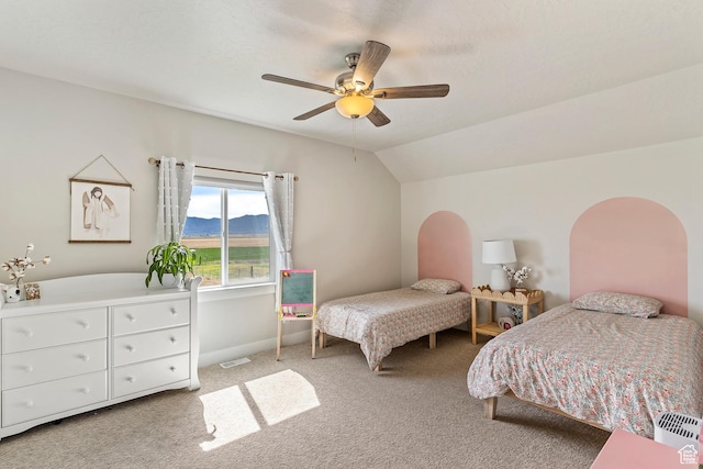 269 Cook Ln, Grantsville, UT 84029 - bedroom with light colored carpet, vaulted ceiling, and ceiling fan