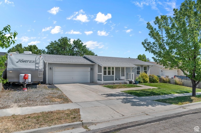 5370 W Cadenza Dr S, West Jordan, UT 84081 - ranch-style home featuring a garage, concrete driveway, covered porch, and a shingled roof