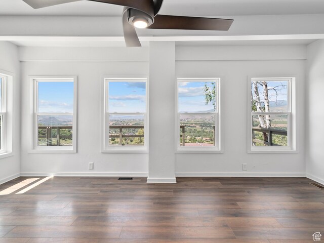 4410 S Upper Aspen Loop Unit 130, Kamas, UT 84036 - empty room featuring dark wood finished floors and baseboards