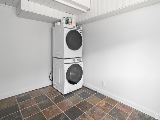 4410 S Upper Aspen Loop Unit 130, Kamas, UT 84036 - laundry area with stacked washer / dryer and stone tile floors
