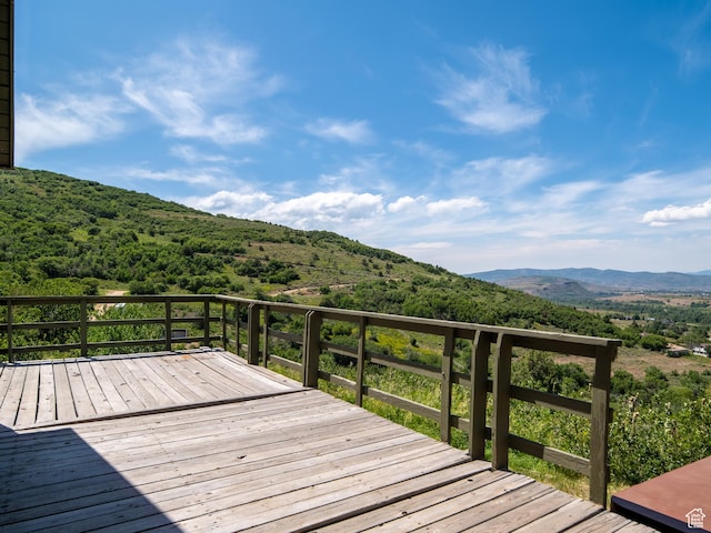 4410 S Upper Aspen Loop Unit 130, Kamas, UT 84036 - wooden deck with a mountain view and a wooded view