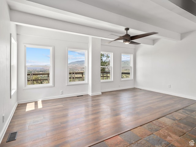 4410 S Upper Aspen Loop Unit 130, Kamas, UT 84036 - unfurnished living room with ceiling fan and dark wood-type flooring