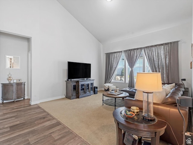 6612 W Terrace Wash Ln S Unit 119, West Jordan, UT 84081 - living room with high vaulted ceiling and wood finished floors